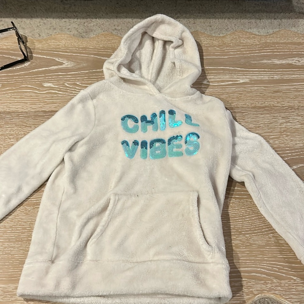 white chill vibes hoodie. Little burn damage from laundry.